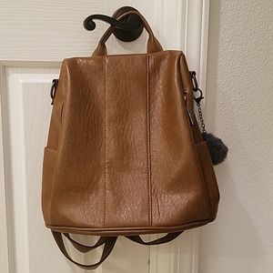 Anti Theft brown backpack NEW WITHOUT TAGS,